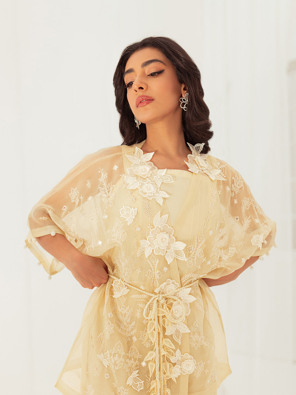 featuring intricate embroidery, pearl, diamonte, and mirror work