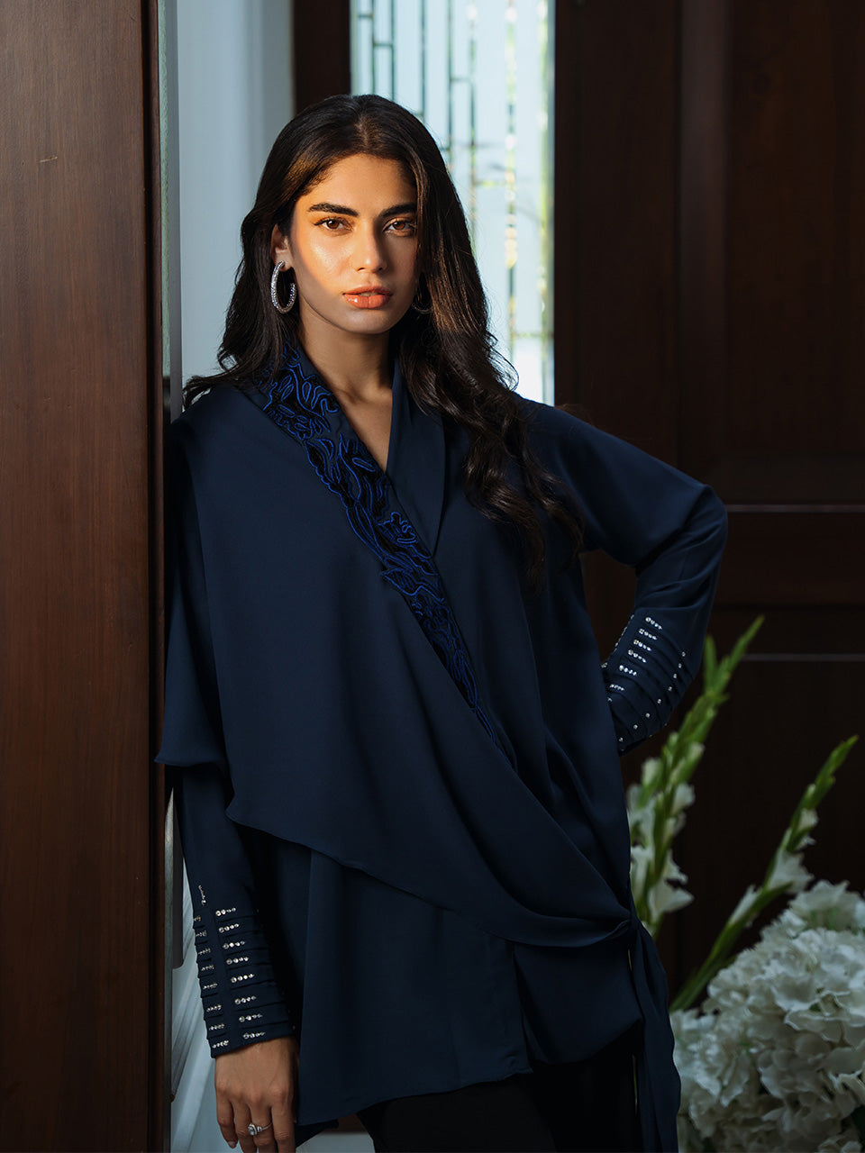 featuring intricate embroidery