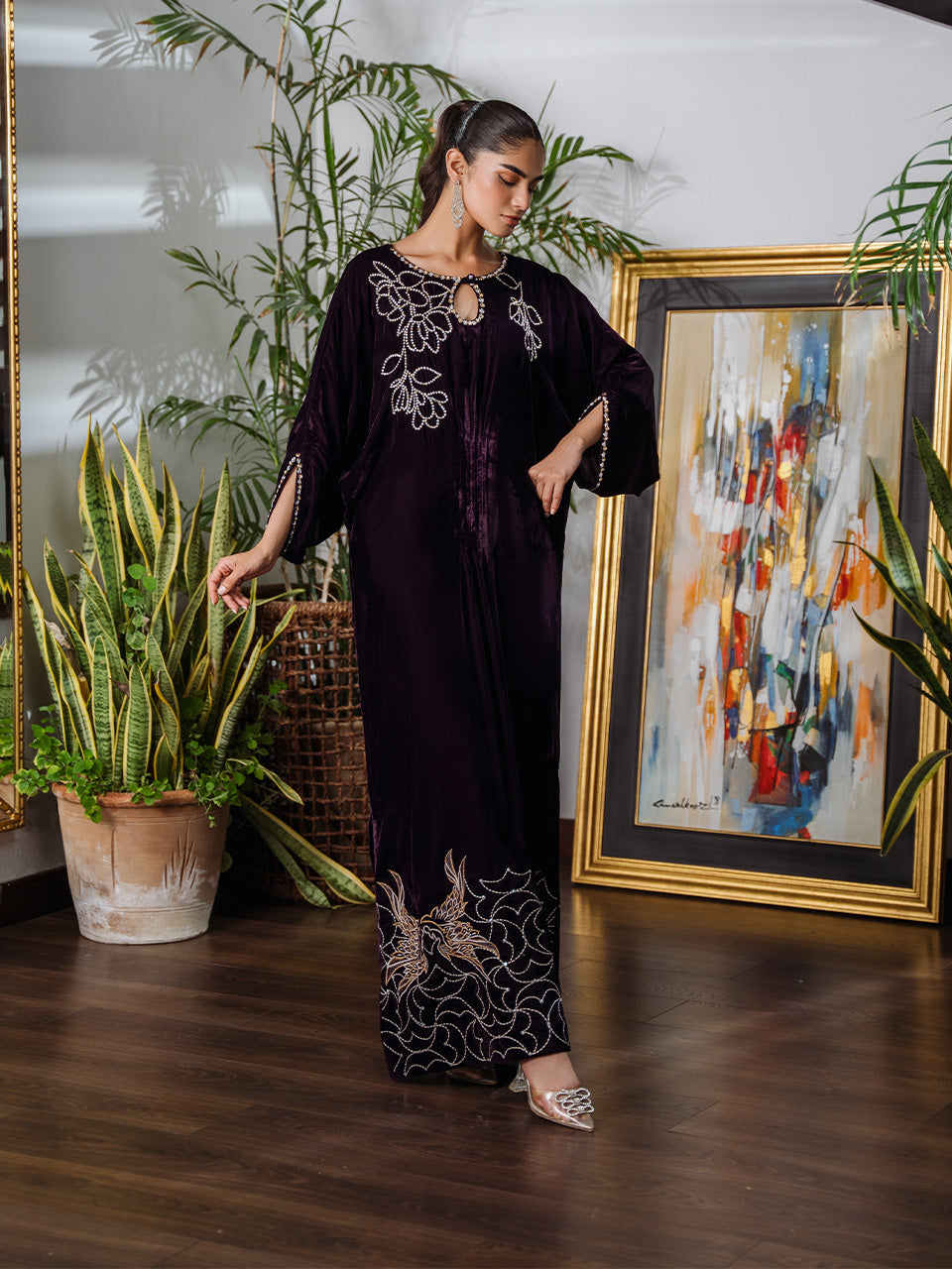 Luxurious deep purple velvet kaftan for festive occasions