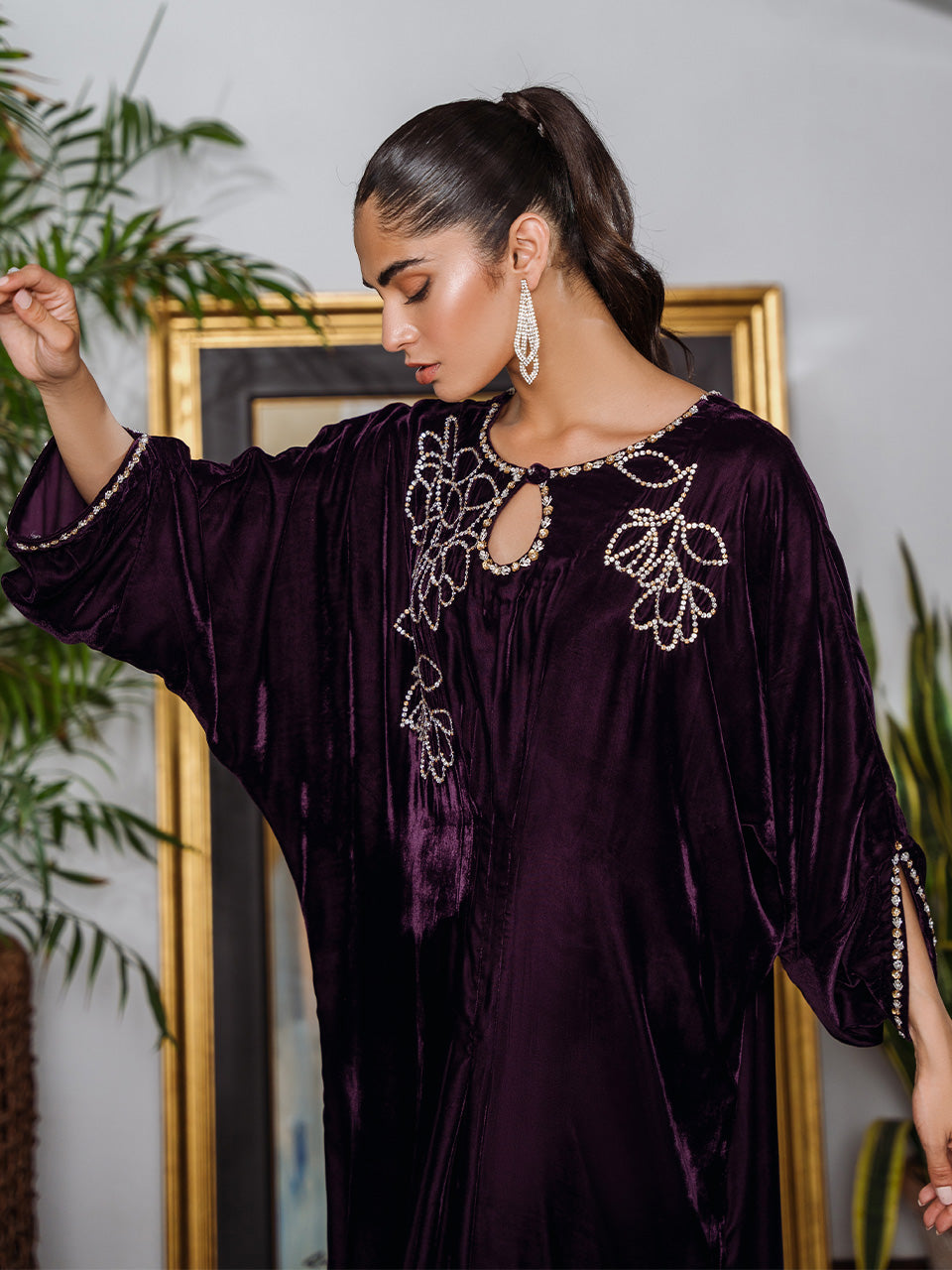 Deep purple velvet kaftan with intricate embroidery