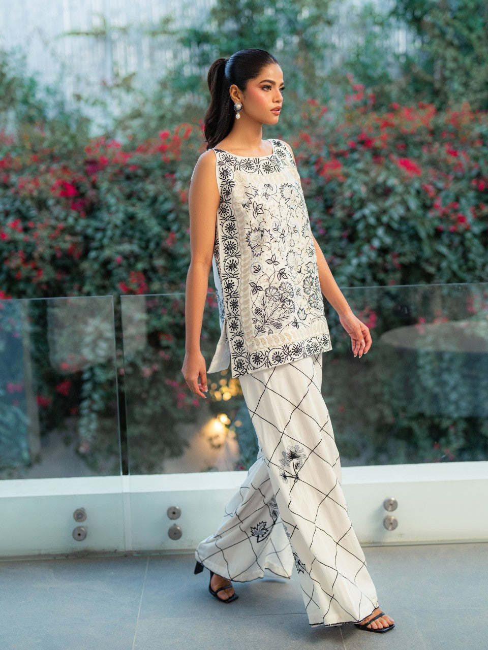 Embroidered luxury flare pants with raw silk top