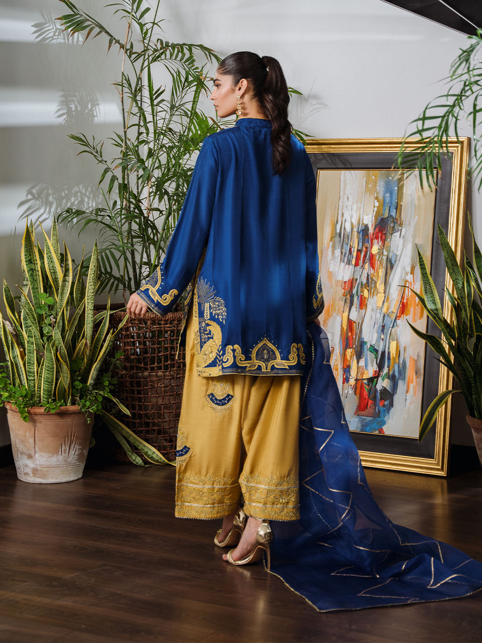 paired with saffron shalwar featuring matching accents