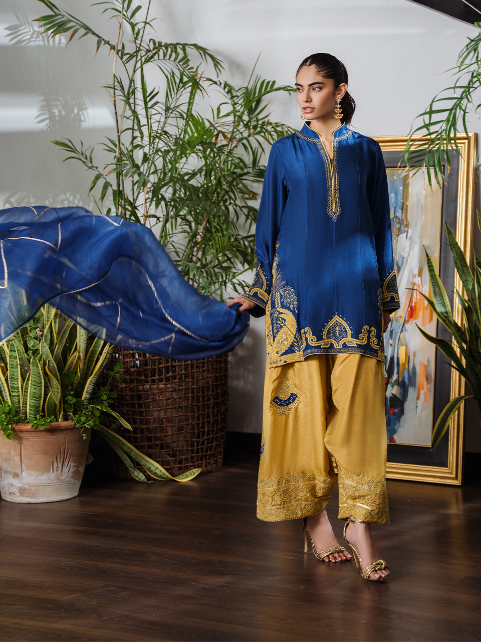 ensemble is completed with a stunning cobalt blue organza dupatta