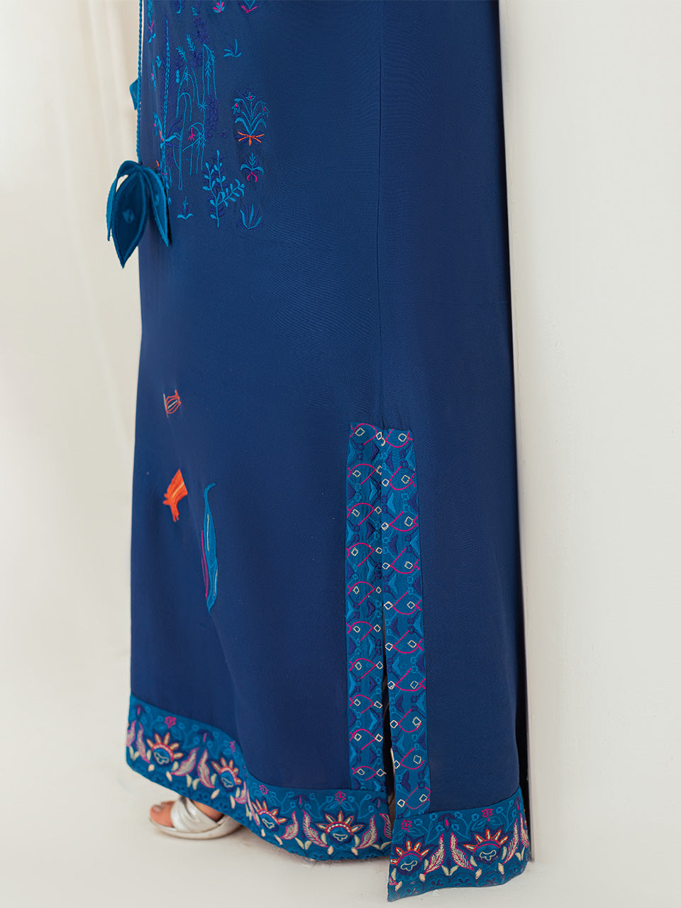 Handcrafted kaftan with appliqué details