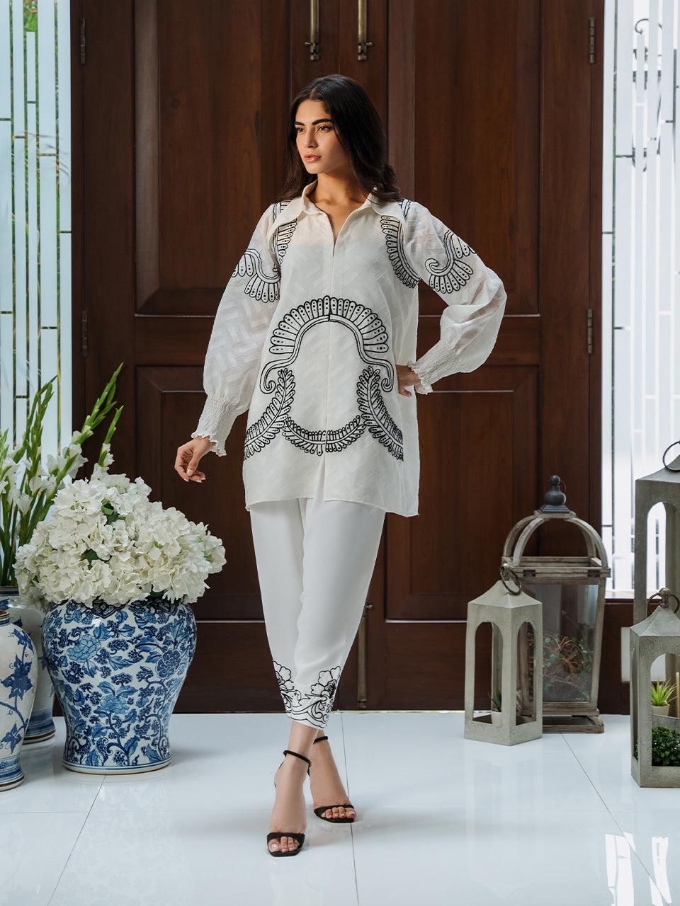 Ethereal white georgette outfit with embroidery details