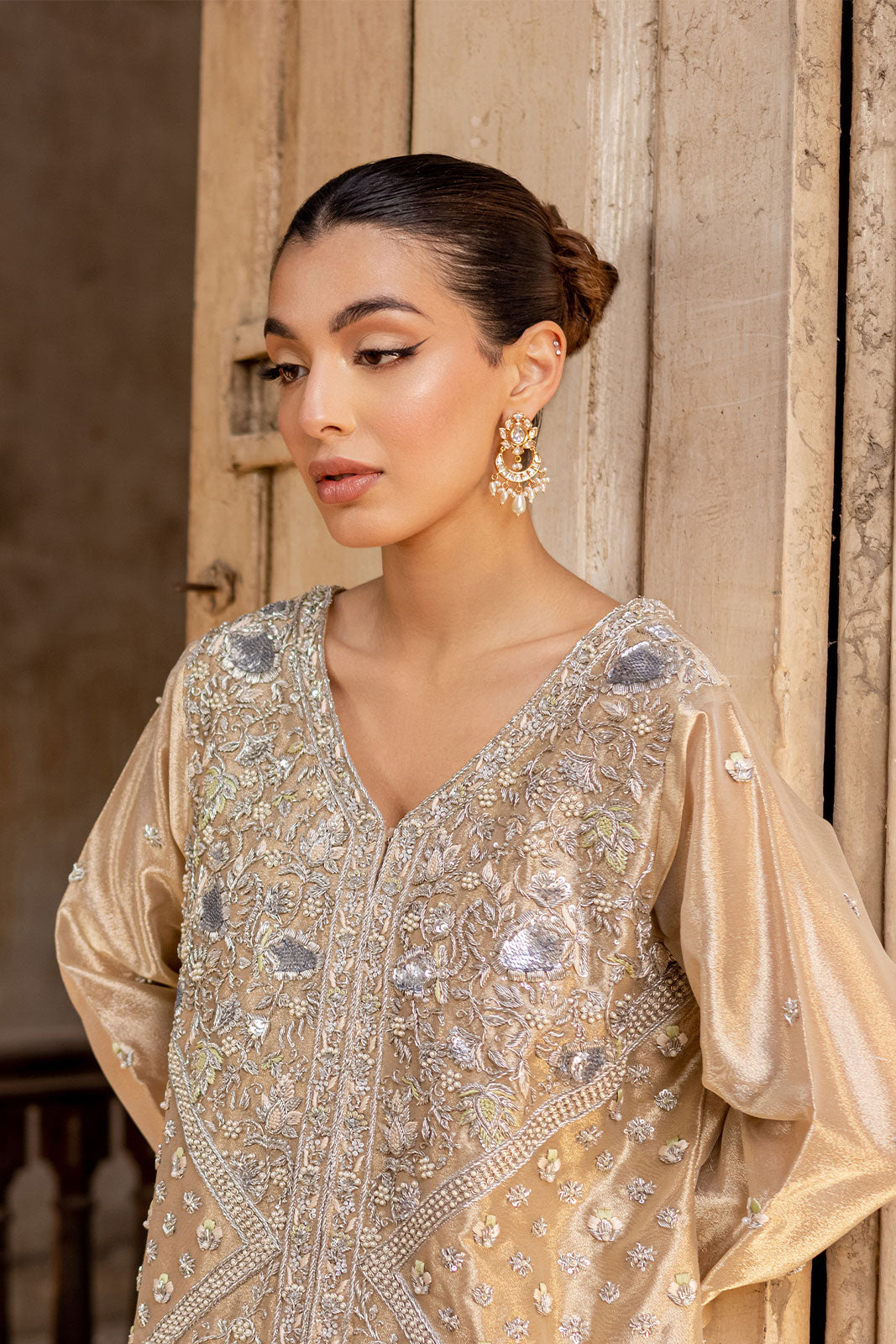 Luxe gold jacket with intricate embroidery