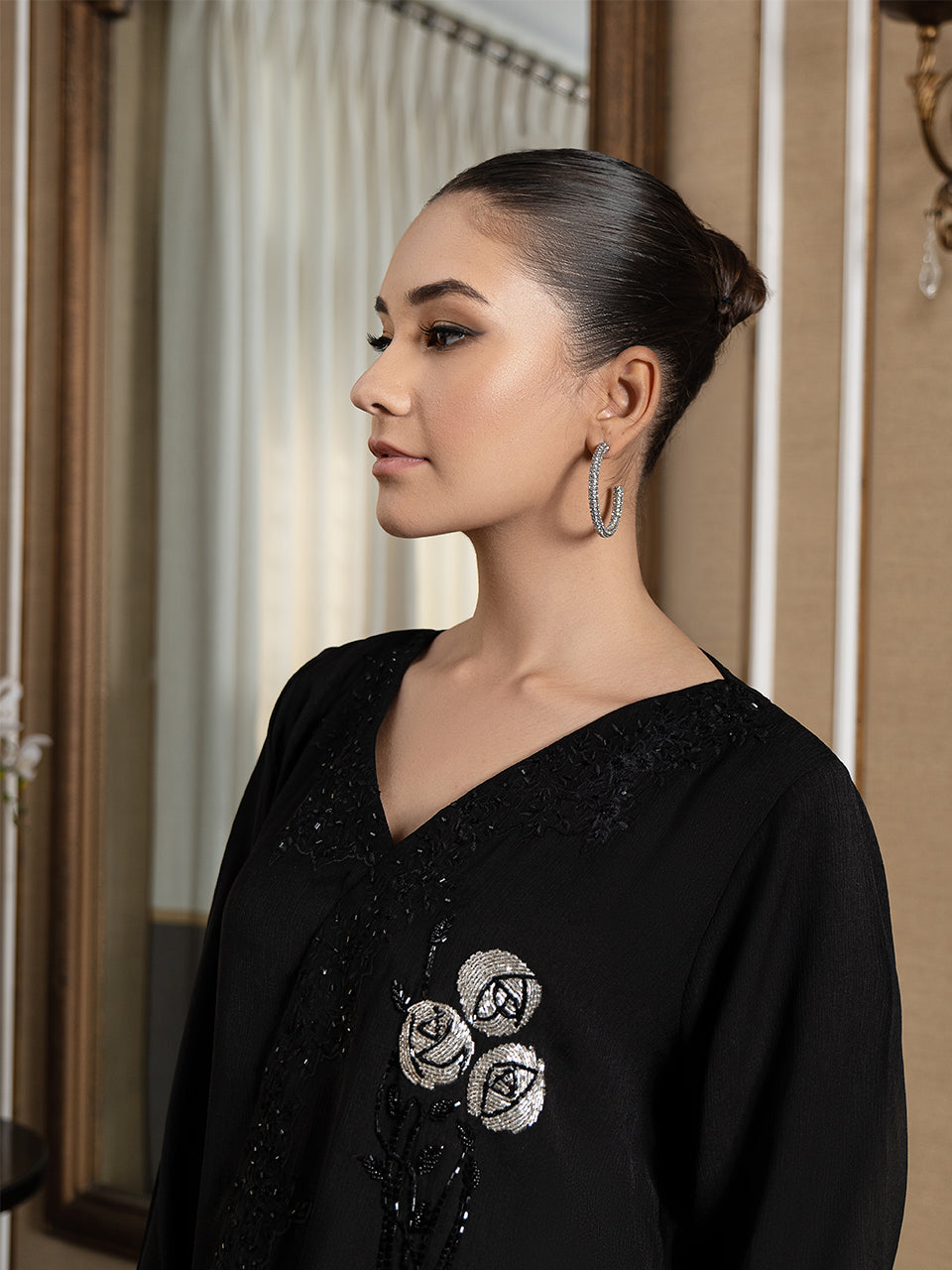 Black tunic with intricate embroidery