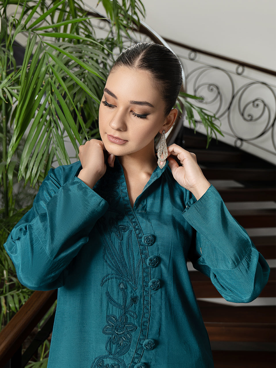 Sea green ensemble with intricate embroidery