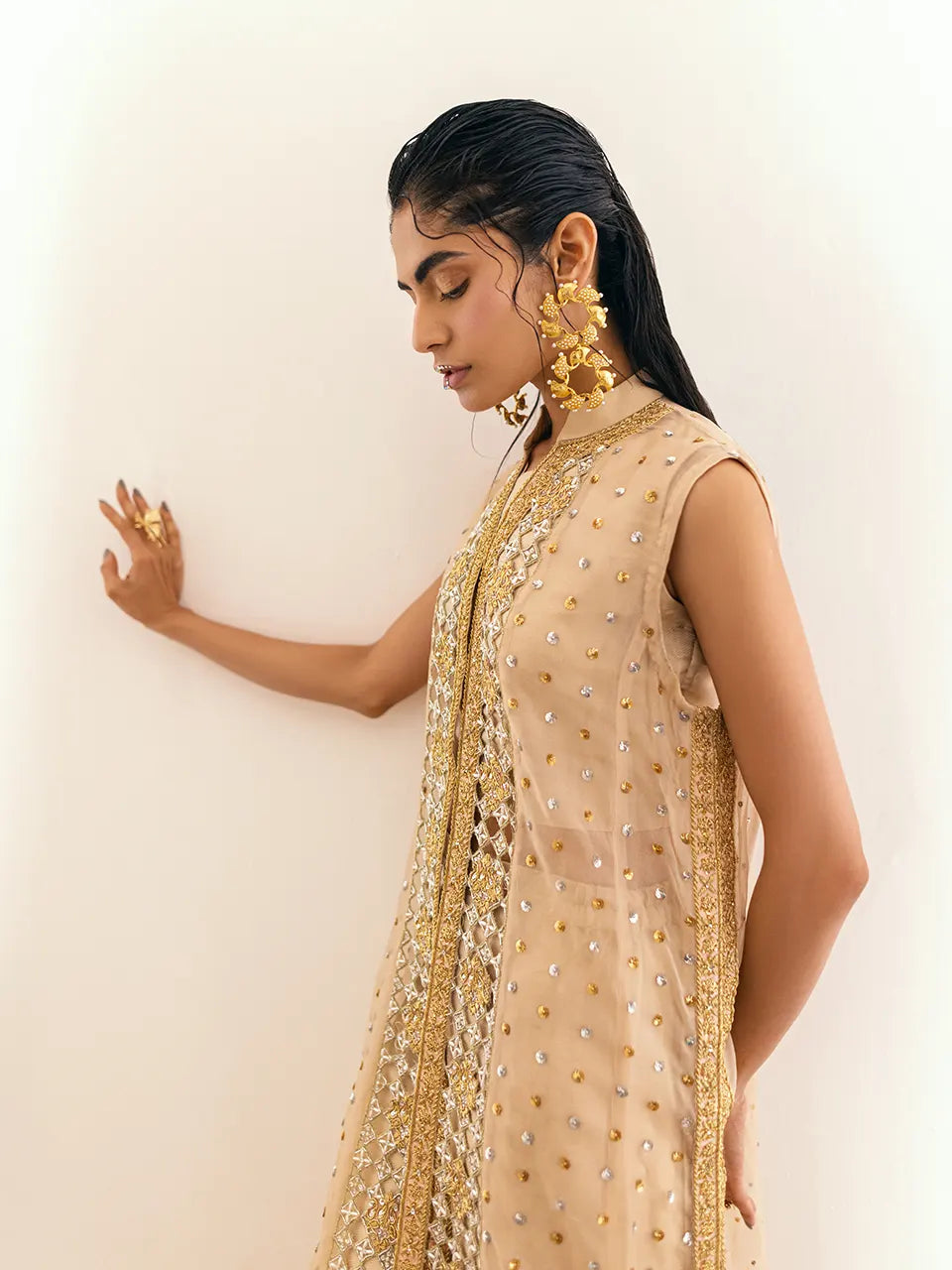 Silver and gold embroidery accents