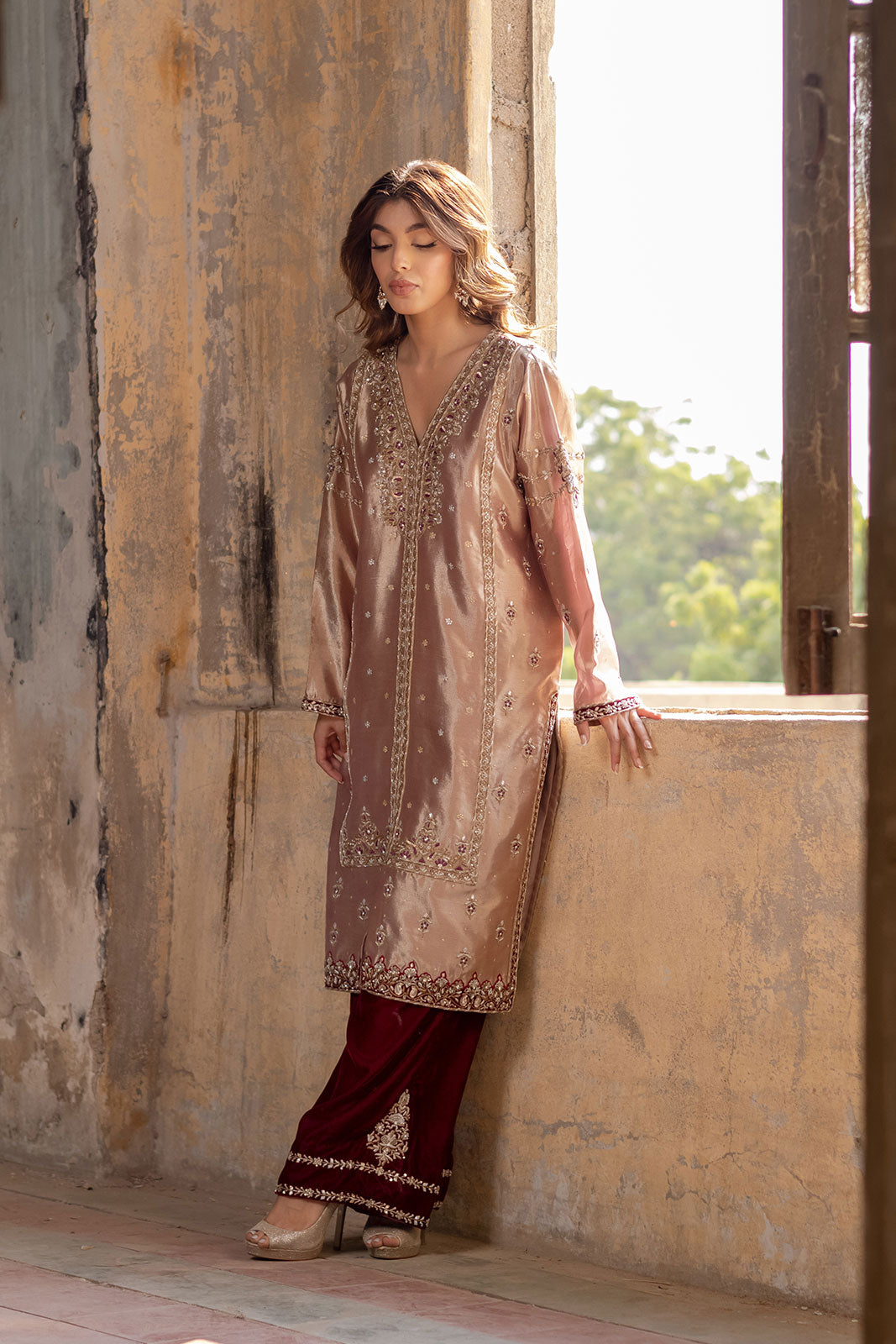 in rose gold tissue and maroon velvet