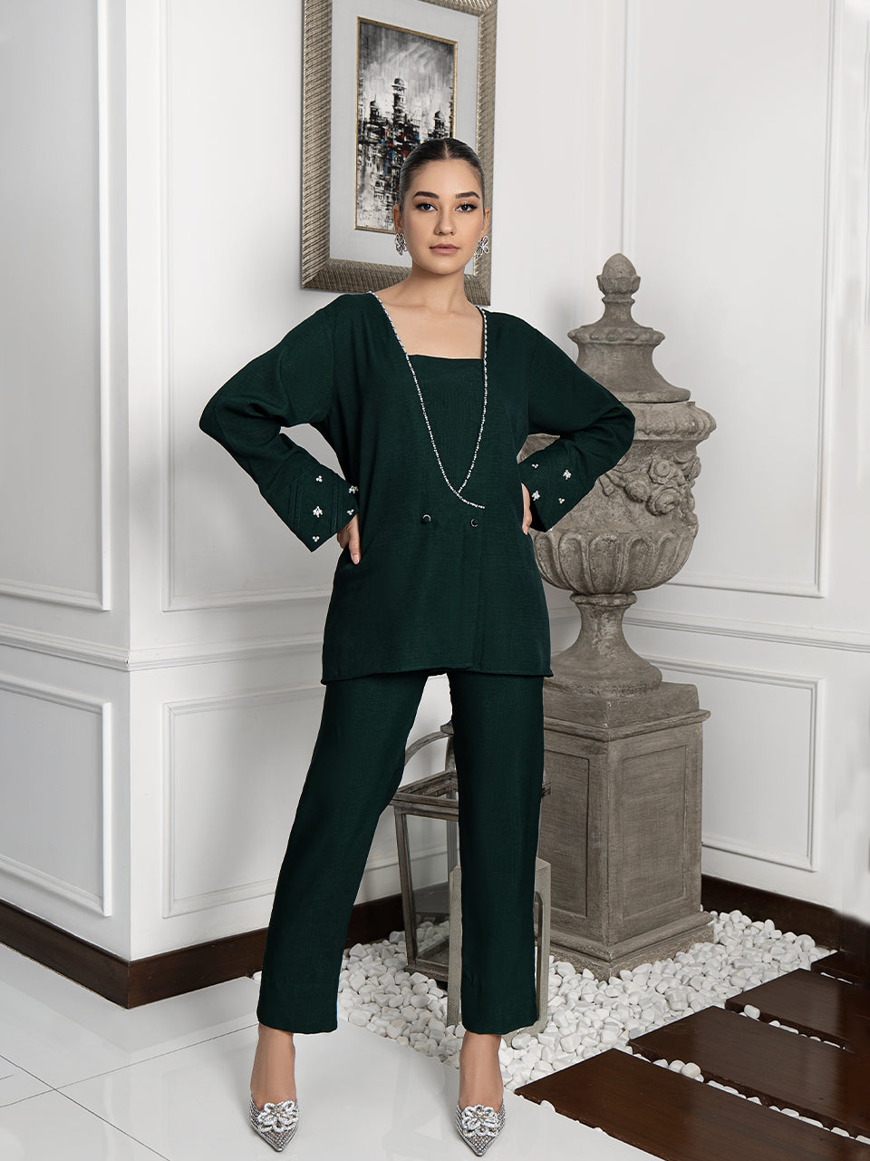 Chic green jacket with front and sleeve embellishments
